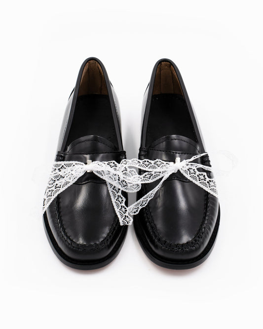 Lace Penny Pin on black penny loafer pins in a front view