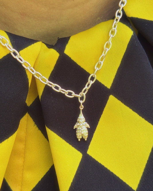 Clown Necklace being worn in silver with a clown costume