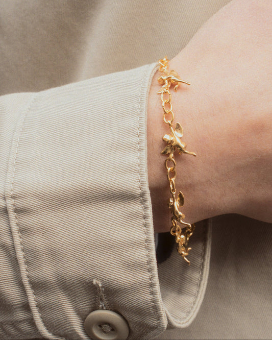Cupid Bracelet in gold worn