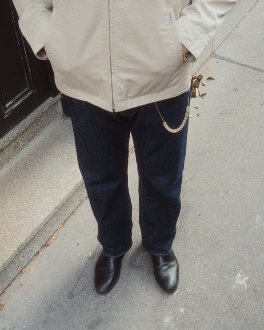 Guy wearing jeans and boots in the Handle Wallet Chain