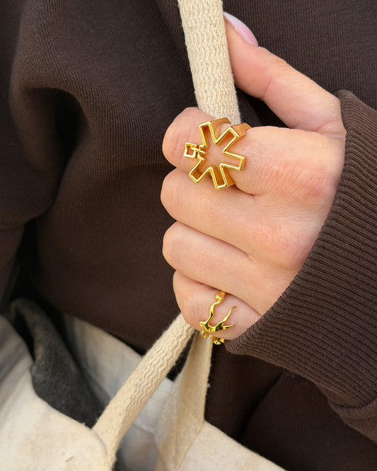 Self Portrait Ring being worn in gold