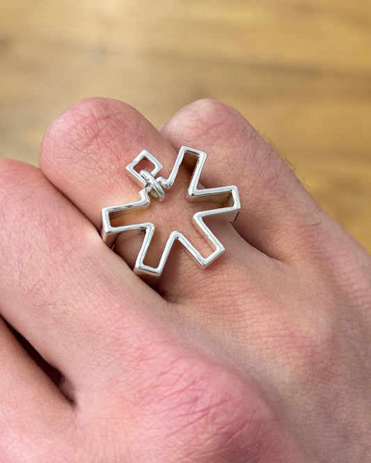 Self-Portrait Ring worn in silver