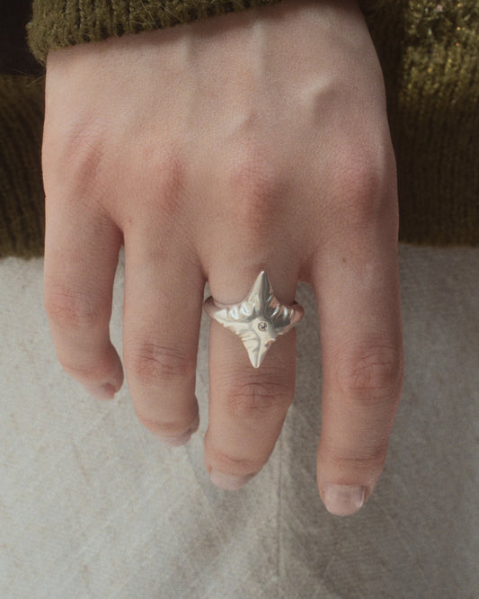 Star Ring in silver worn on hand
