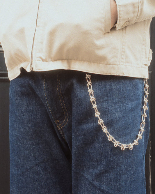 knot wallet chain on jeans and jacket