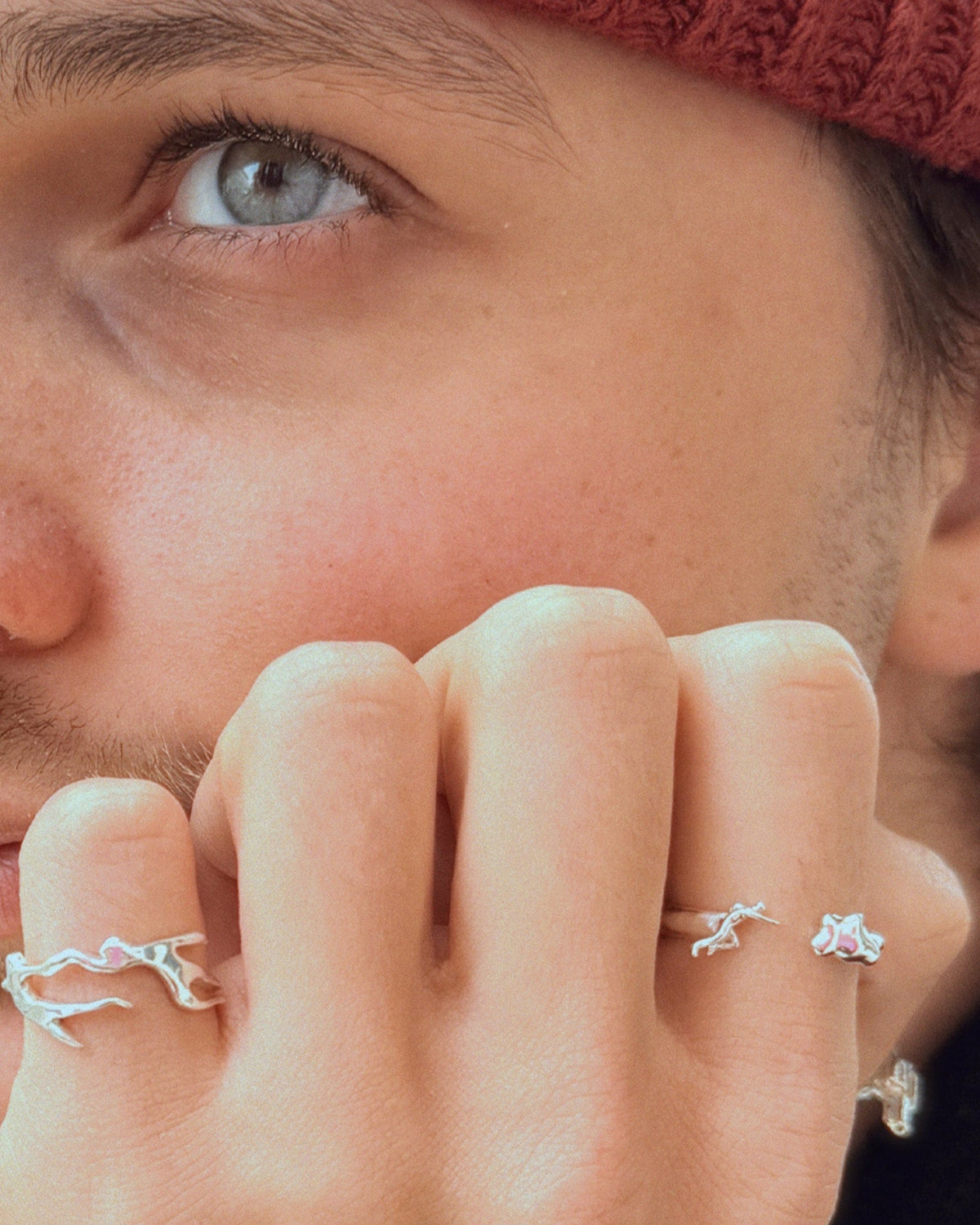 guy in thinking pose showing the dreamchaser ring in silver