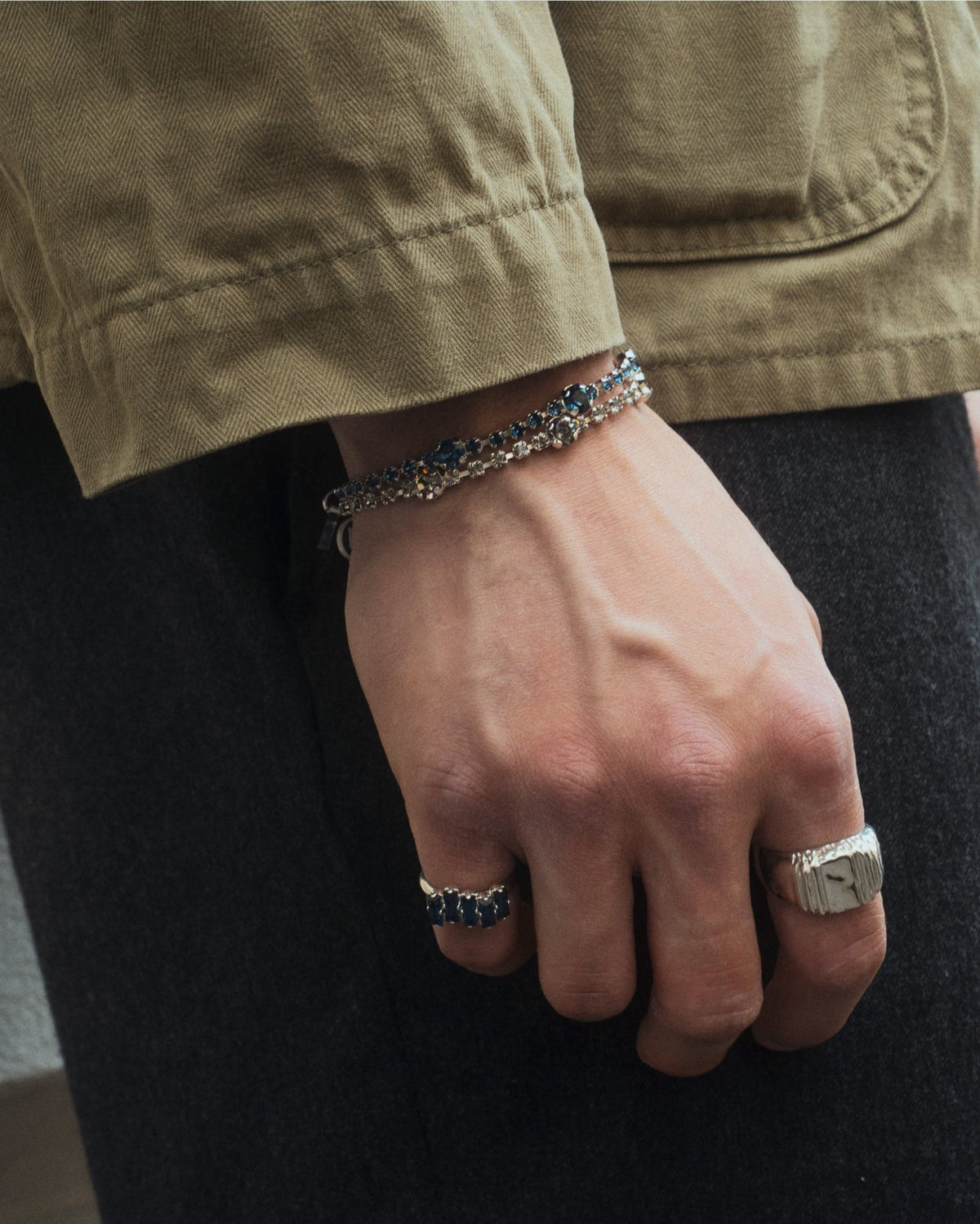 Daydream Ring in silver worn by male in green jacket
