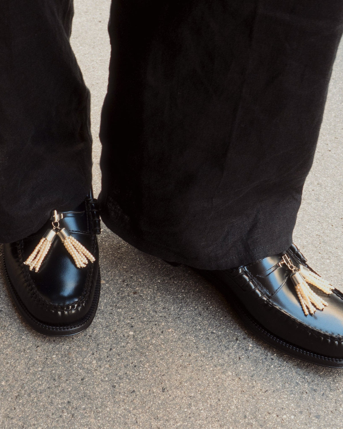 pearl tassel penny pins being worn on penny loafer
