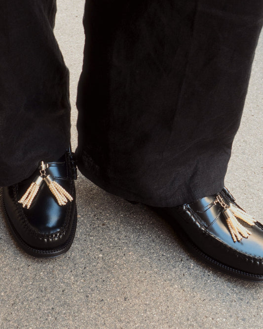 pearl tassel penny pins being worn on penny loafer